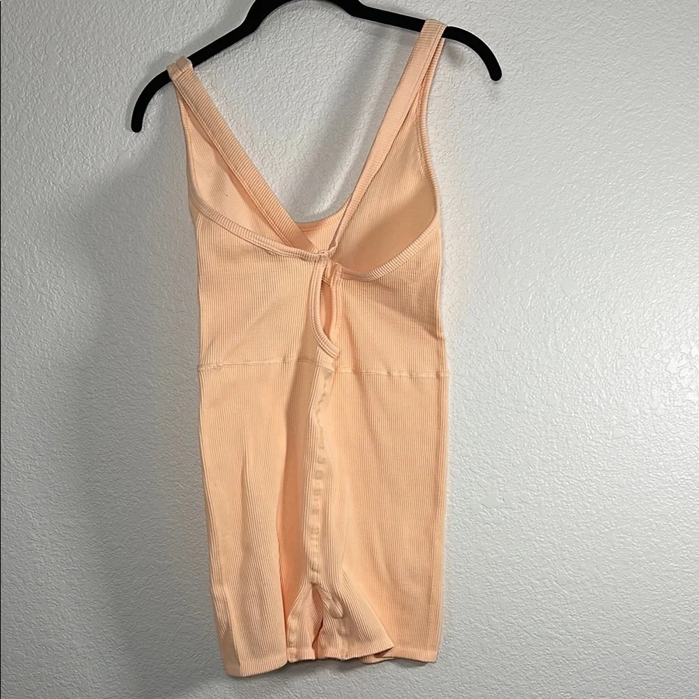 Free People Movement Good Karma Romper Peach Ribbed Cross Back Bodysuit M/L - Picture 5 of 8